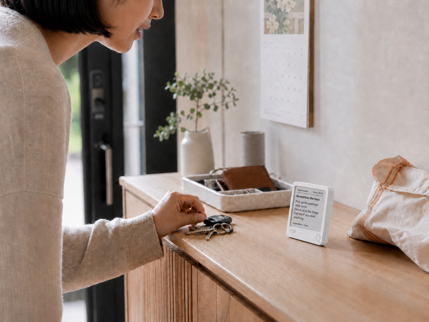 A family member recording a voice memo on ZECTRIX NOTE4 near the entryway